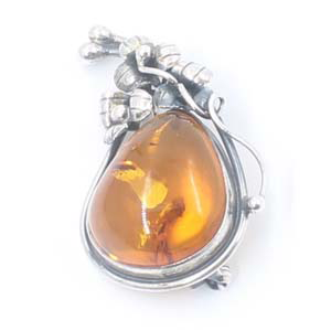 Amber silver brooch